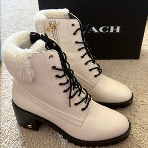 Leather and faux shearling upper
Man-made leather lining and footbed